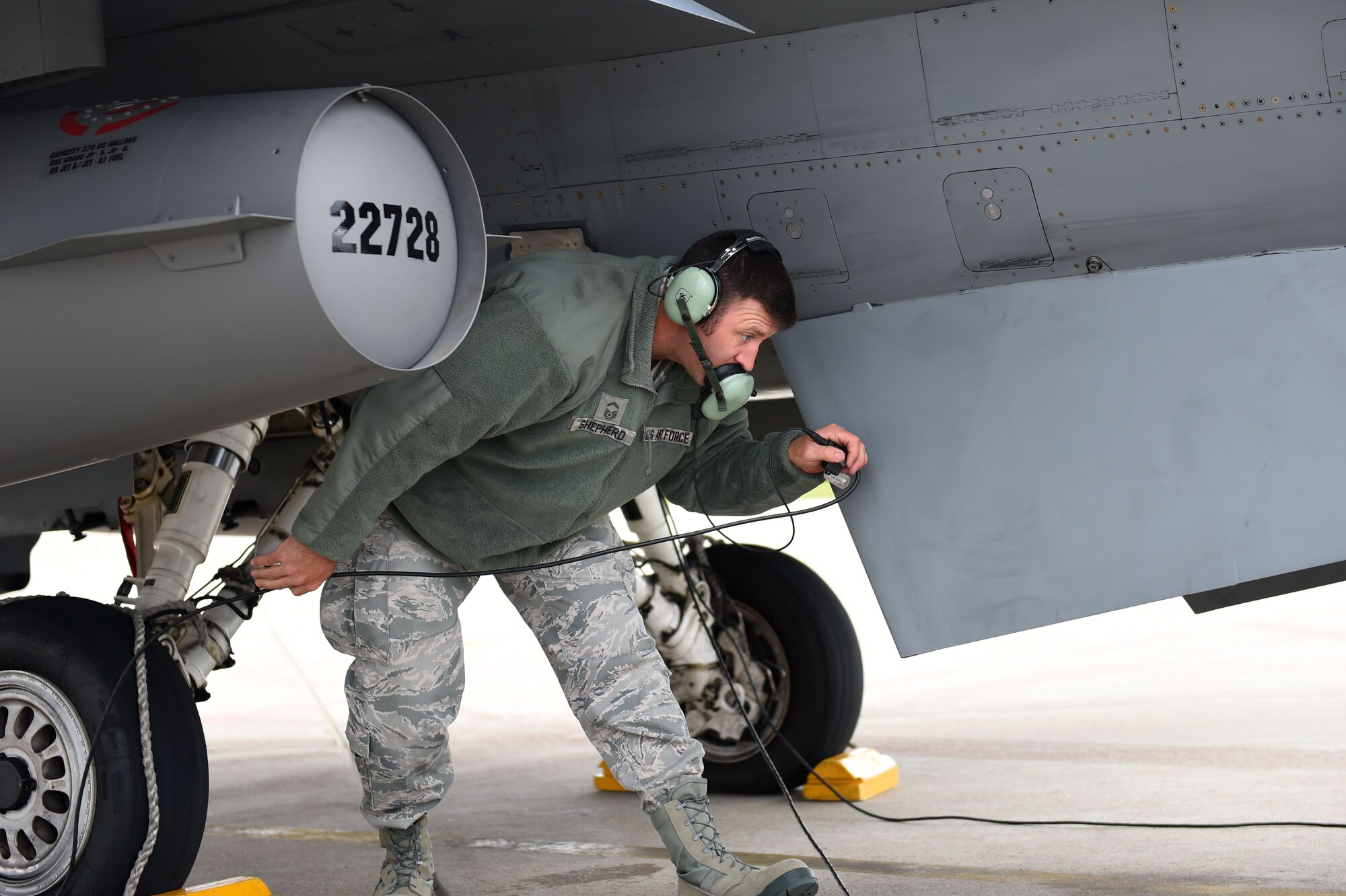 Senior Master Sgt. Robert Shepherd, 132d Wing Public Affairs superintdent and transient alert volunteer, performs a pre-flight check of an F-16c aircraft on May 24, 2017, at the 114th Fighter Wing, Sioux Falls, South Dakota. Shepherd was an F-16 crew chief at the 132d Wing for 16 years before the mission change. (U.S. Air National Guard photo by Tech. Sgt. Nicholas Sirna)