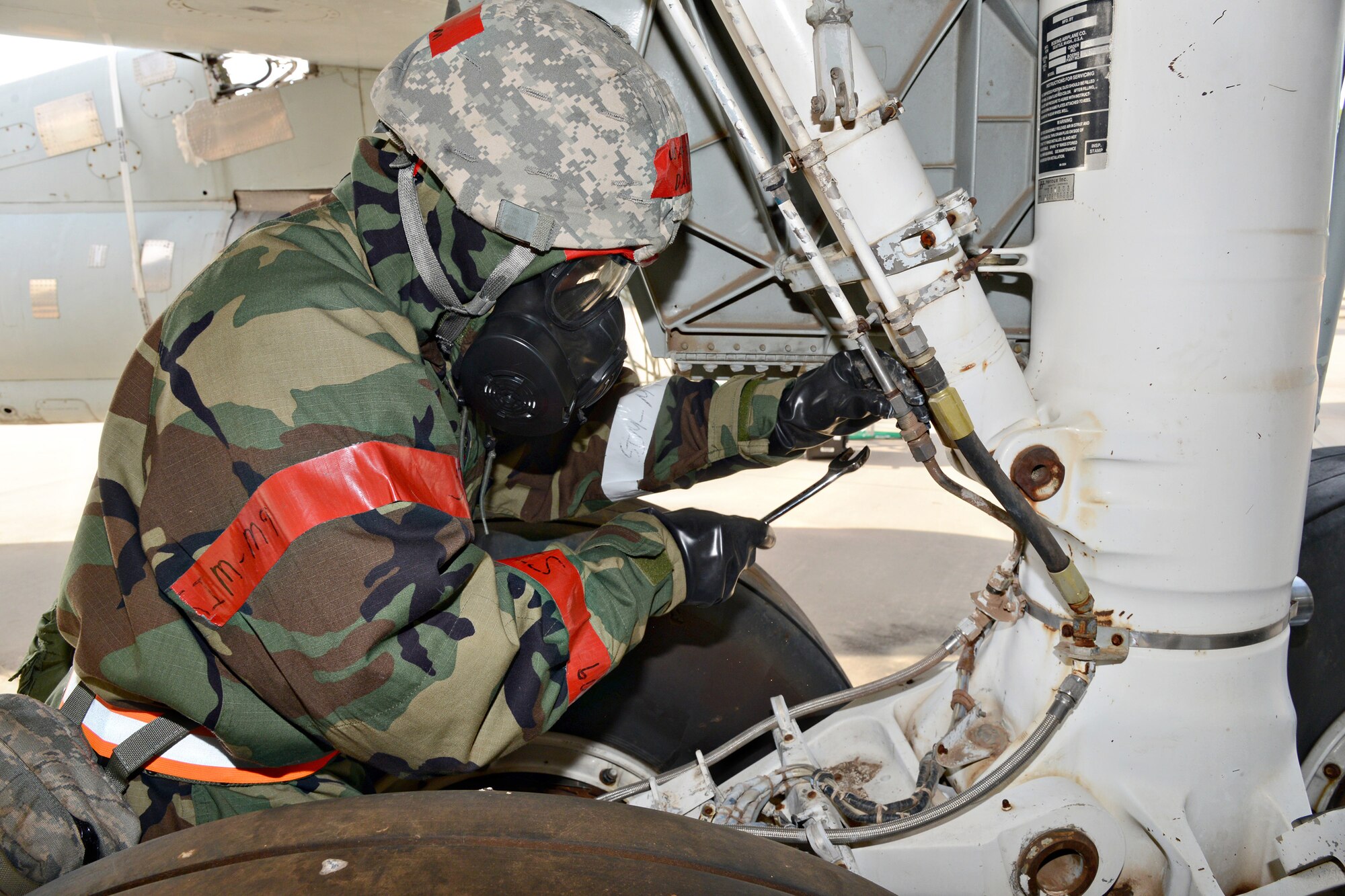 Second Lt. David Durham performs a repair on a KC-135 hydraulics line during a recent war wagon exercise for the 76th Aircraft Maintenance Group’s Expeditionary Depot Maintenance Flight. The flight consists of 25 personnel that provide aircraft battle damage repair and expeditionary depot maintenance on several aircraft. (Air Force photo by Kelly White)