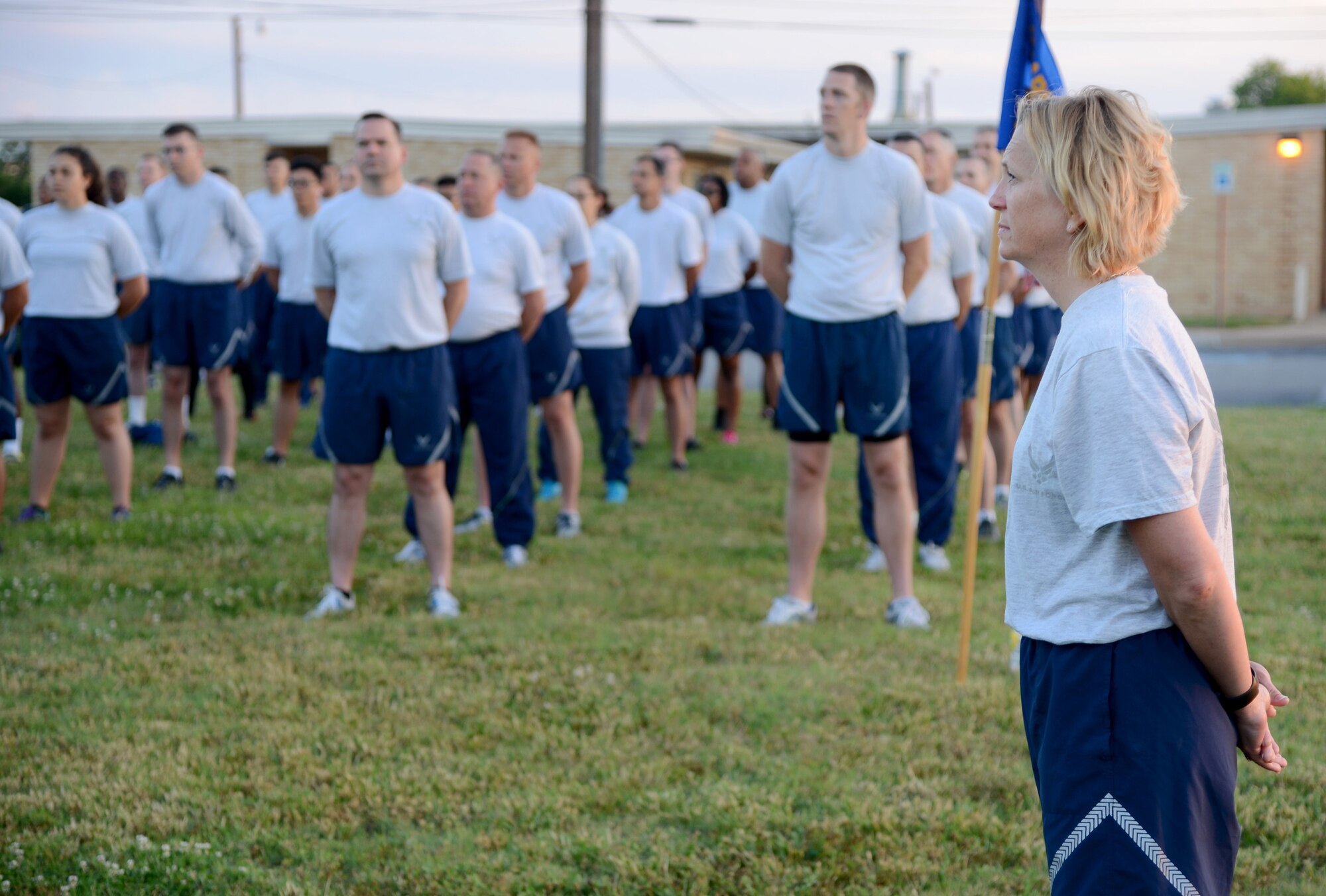 72nd Air Base Wing Command Chief Master Sgt. Melissa Erb, awaits instruction, along with fellow Wildcatters, during the wing’s Wildcatter physical training May 31. (Air Force photo by Kelly White)