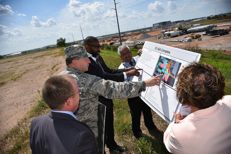 Jeffrey Allen, Air Force Sustainment Center executive director, left, and Maj. Gen. Mark Johnson, Oklahoma City Air Logistics Complex commander, show plans for the future site of the KC-46 sustainment campus to Tim Bridges, assistant deputy chief of staff for logistics, engineering and force protection at the Pentagon, right, during a tour of Tinker Air Force Base June 6. During his visit to Tinker, Bridges gained a better understanding of the AFSC mission following his tour of the Oklahoma City Air Logistics Complex. Bridges also held discussions on the Maintenance Repair and Overhaul Initiative, Functional Risk Reduction Effort, Lean Depot Management System, Requirements Review Depot Determination and Supply Chain Logistics. (Air Force photo by Darren D. Heusel)