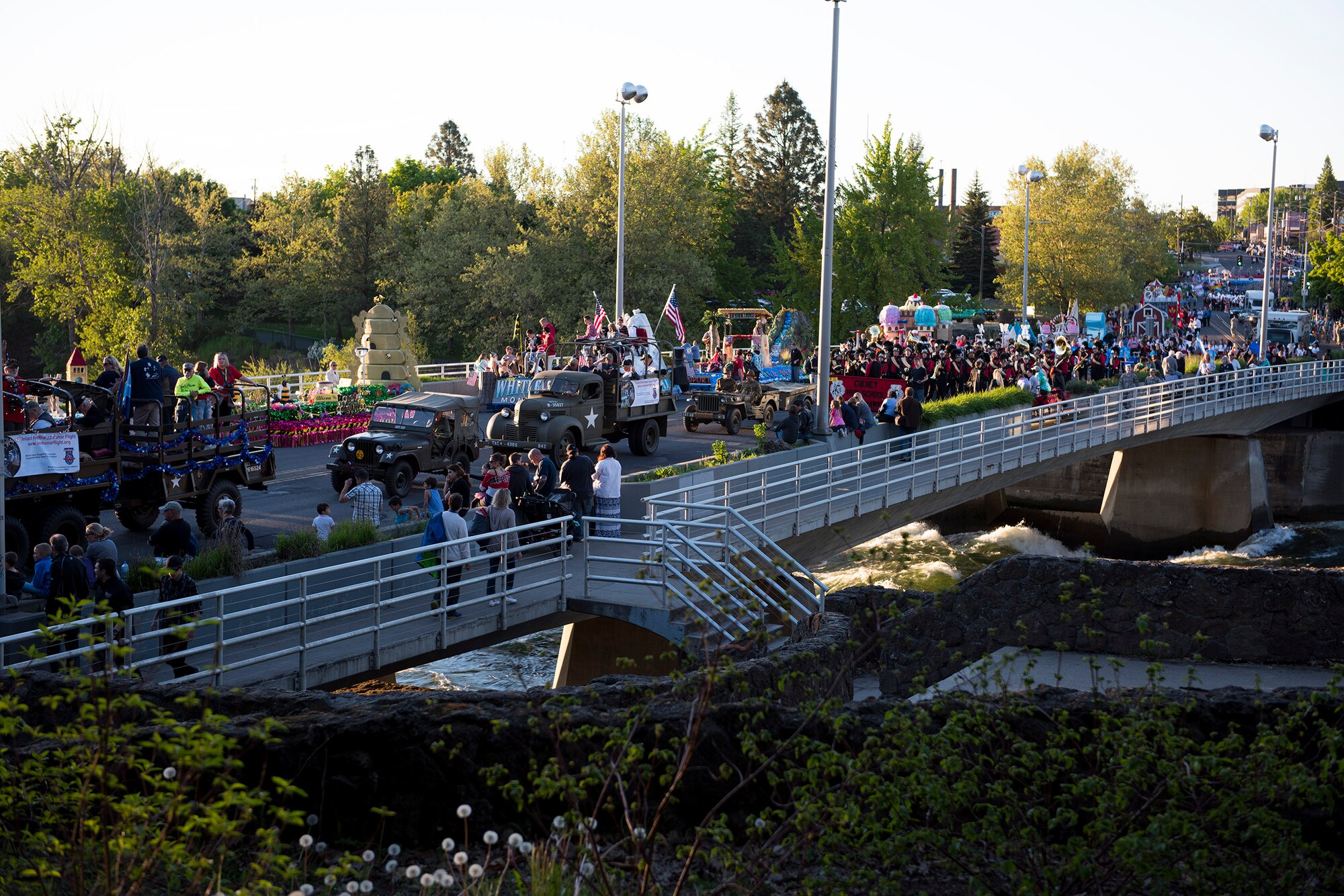 Participants of the annual Lilac Festival Armed Forces Torchlight Parade line up at the starting line near Riverfront Park May 20, 2017, Spokane, Washington. Dozens of civilian and military groups from across the region donated time and floats for the parade.(U.S. Air Force photo / Airman 1st Class Ryan Lackey)