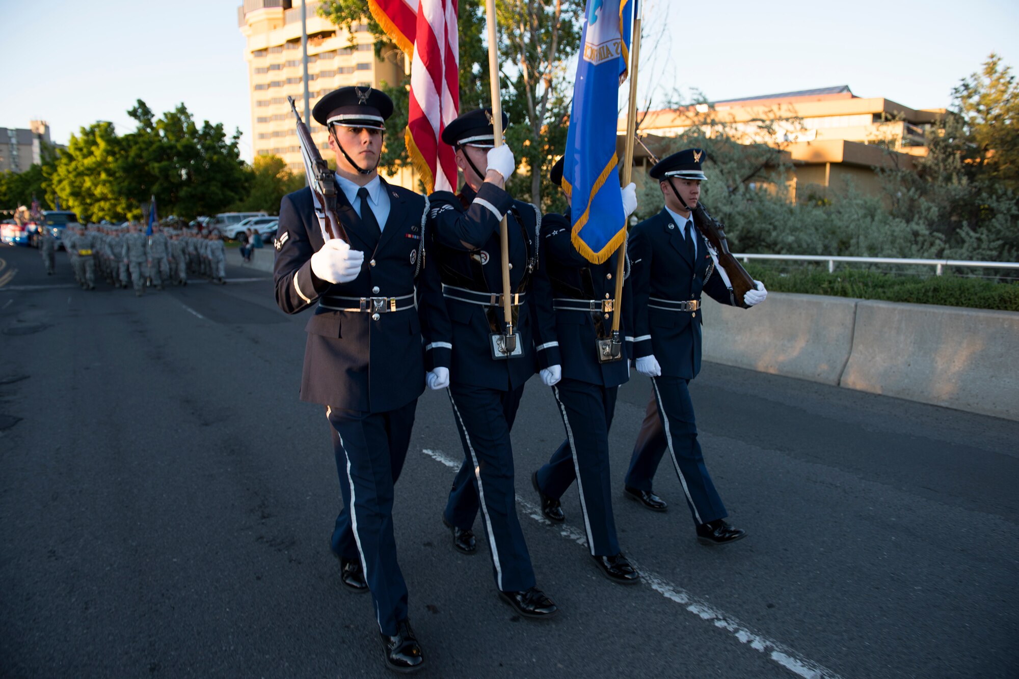 Members of the Fairchild Air Force Base Honor Guard march ahead of the main Airmen formation during the annual Lilac Festival Armed Forces Torchlight Parade May 20, 2017, Spokane, Washington. Honor guard teams represent the highest form of military professionalism by preforming in hundreds of events each year.
(U.S. Air Force photo / Airman 1st Class Ryan Lackey)