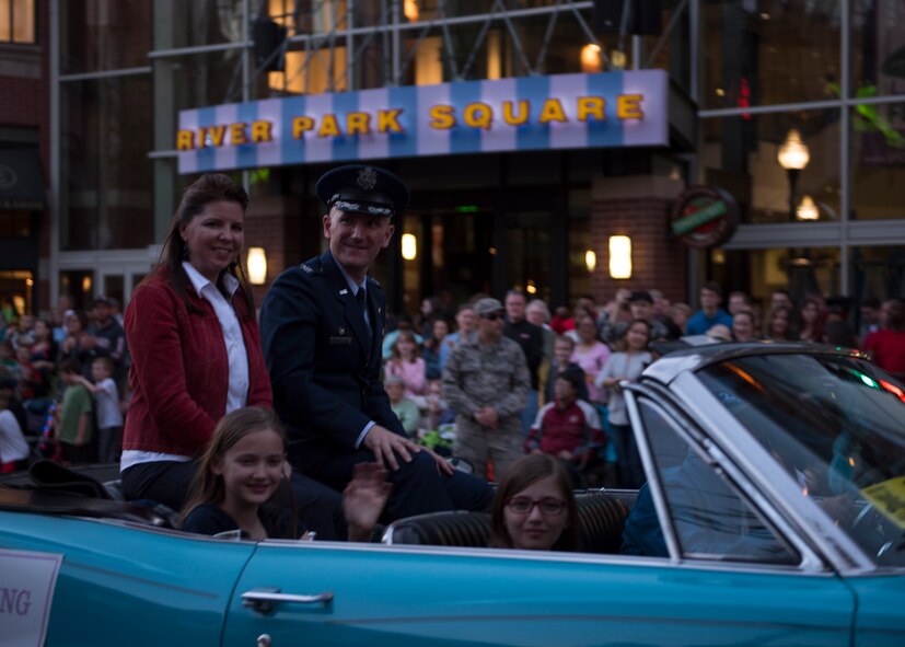 Col. Ryan Samuelson, 92nd Air Refueling Wing commander, rides with his family as part of the procession during the annual Lilac Festival Armed Forces Torchlight Parade May 20, 2017, Spokane, Washington. The city of Spokane and it's residents have supported the U.S. Armed Forces with Lilac Festival events since 1949.
(U.S. Air Force photo / Airman 1st Class Ryan Lackey)