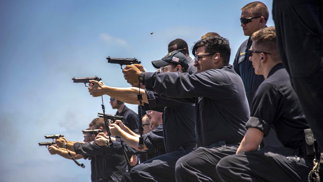 Sailors participate in an M9 service pistol qualification aboard the guided-missile cruiser USS Philippine Sea in the Mediterranean Sea, June 16, 2017. The ship is operating in the U.S. 6th Fleet area of responsibility, supporting U.S. national security interests in Europe and Africa. Navy photo by Petty Officer 2nd Class Patrick Ian Crimmins