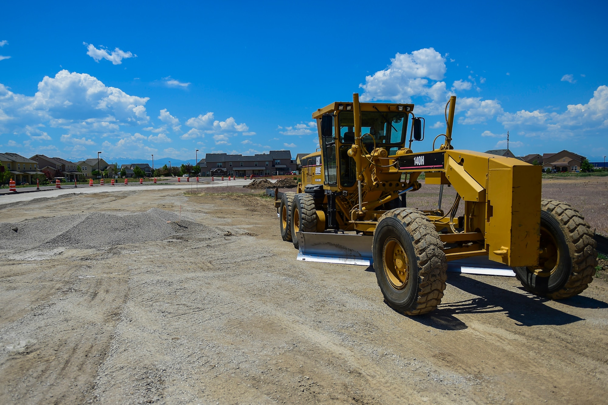 Contractors begin reconstruction on W. Breckenridge Street, at the entrance of base housing on Buckley Air Force Base, Colo. The project includes road realignment and installing a pedestrian crosswalk. (U.S. Air Force photo by Airman Jacob Deatherage/Released)