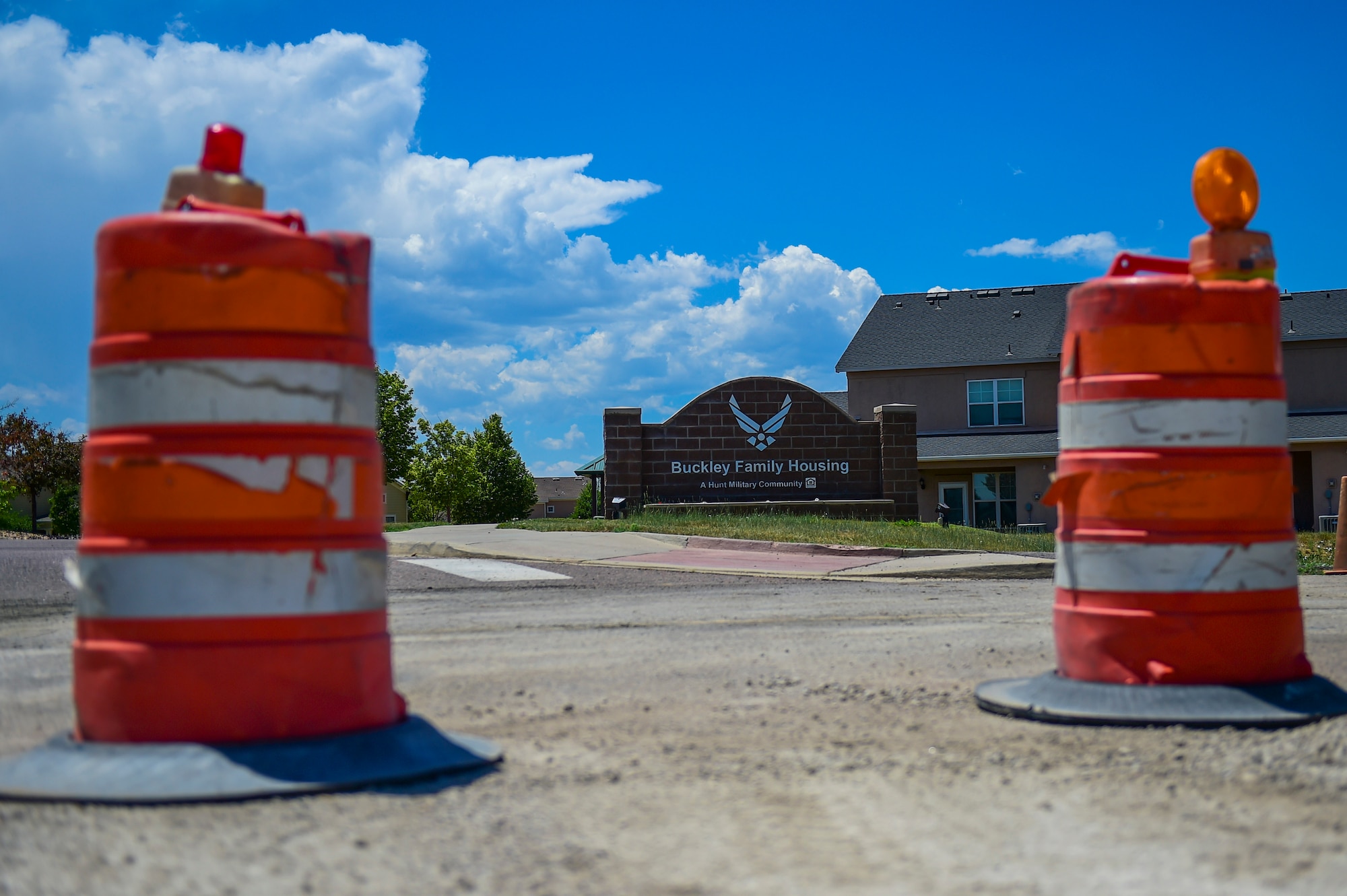 Contractors begin reconstruction on W. Breckenridge Street, at the entrance of base housing on Buckley Air Force Base, Colo. The project includes road realignment and installing a pedestrian crosswalk. (U.S. Air Force photo by Airman Jacob Deatherage/Released)