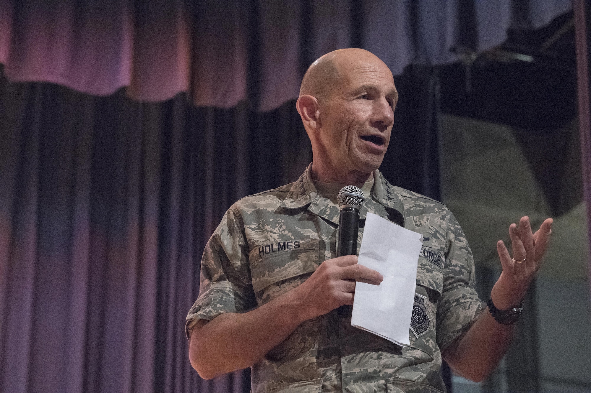 Gen. Mike Holmes, commander of Air Combat Command, discusses the importance of squadron revitalization during an all call at Joint Base Langley-Eustis, Va., June 20, 2017. In a recent letter to Airmen, Holmes stressed that squadron readiness, his first priority, begins with putting Airmen and families first. (U.S. Air Force photo by Staff Sgt. Nick Wilson)