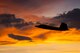 An F-22 Raptor from the 433rd Weapons Squadron, Nellis Air Force Base, Nev., takes off into the Nevada sunset for a US Air Force Weapons School training exercise June 8, 2017.  The Raptor performs both air-to-air and air-to-ground missions, allowing full realization of operational concepts vital to the 21st century Air Force. (U.S Air Force photo by Senior Airman Joshua Kleinholz)