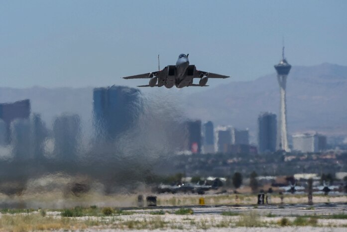 An F-15E Strike Eagle from the 17th Weapons Squadron, Nellis Air Force Base, Nev., takes off for a US Air Force Weapons School training exercise June 13, 2017. The F-15E uses two crew members, a pilot and a weapon systems officer. (U.S. Air Force photo by Airman 1st Class Andrew D. Sarver/Released)