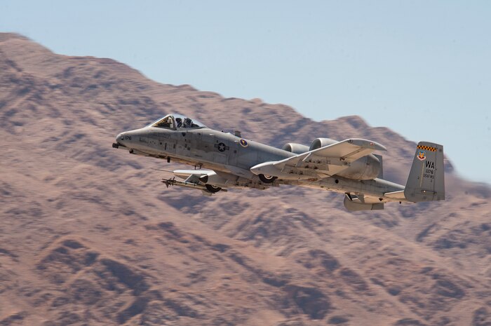 An A-10 Thunderbolt II assigned to the 66th Weapons Squadron, Nellis Air Force Base. Nev., takes off for a United States Air Force Weapons School training exercise June 14, 2017. Every six months, the USAFWS graduates approximately 100 Weapons Officers and enlisted specialists who are tactical system experts, weapons instructors and leaders of Airmen. (U.S Air Force photo by Senior Airman Joshua Kleinholz)