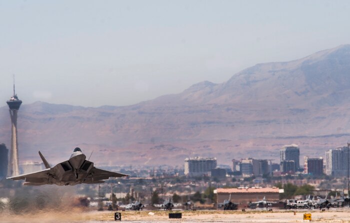 An F-22 Raptor from the 433rd Weapons Squadron, Nellis Air Force Base, Nev., takes off for a United States Air Force Weapons School training exercise June 8, 2017. The USAFWS traces its roots to the Aircraft Gunnery School established in 1949 at Las Vegas Air Force Base, which later became Nellis AFB in 1950. (U.S Air Force photo by Senior Airman Joshua Kleinholz)