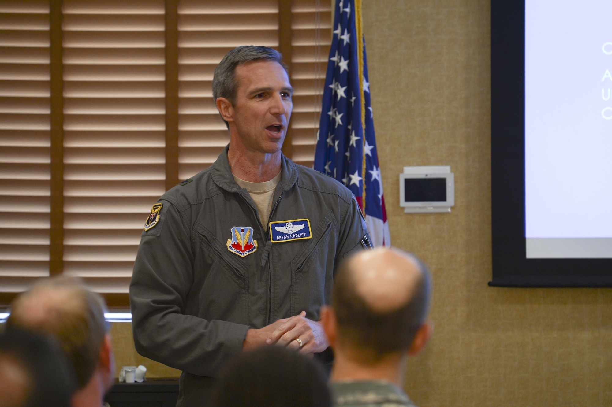 Brig. Gen. Bryan Radliff, 12th Air Force (Air Forces Southern) mobilization assistant to the commander, gives opening remarks during a speaker series event at Davis-Monthan Air Force Base, Ariz., June 19, 2017, for the 12th Air Force (Air Forces Southern) Academic Outreach Program with the University of Arizona. The intent of the speaker series is to facilitate the exchange ideas between government and academic institutions while fostering collaborative discussions about global issues. (U.S. Air Force photo by Staff Sgt. Angela Ruiz)