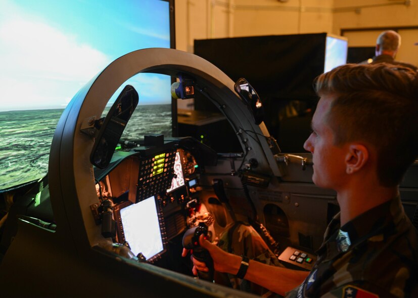 Cadet Lester Dewalt, Civil Air Patrol cadet, focuses during a flight simulation at Laughlin Air Force Base, Texas, June 14, 2017. Dewalt was part of a class of 30 cadets who attended a week-long pilot training immersion.  Part of the course covered flight simulation, which the cadets spent two days training on the same simulators Laughlin pilots use. (U.S. Air Force photo/Airman 1st Class Benjamin N. Valmoja)