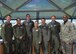 Col. Thomas Shank, 47th Flying Training Wing commander (far left), and Chief Master Sgt. Ronald Harper, 47th Mission Support Group superintendent (far right), pose for a photo with the Runway Supervisory Unit controllers at Laughlin Air Force Base, June 16, 2017. Shank and Harper had an opportunity to visit the RSU, and learned about the day-to-day procedures of an RSU controller. (U.S. Air Force photo/Airman 1st Class Benjamin N. Valmoja)