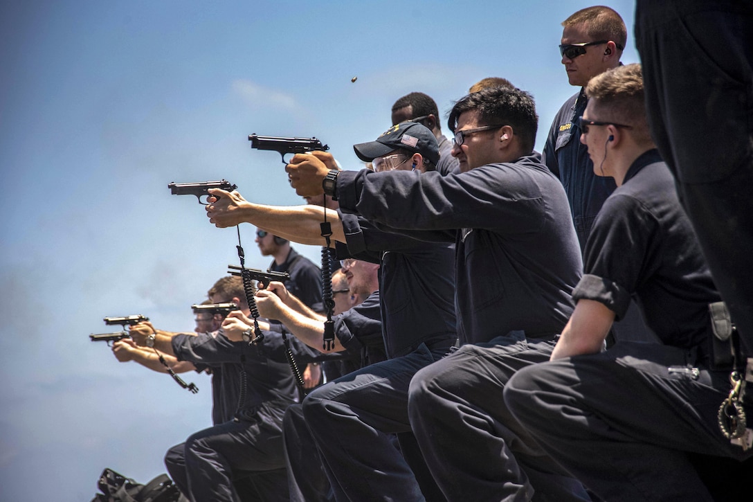 Sailors participate in an M9 service pistol qualification aboard the guided-missile cruiser USS Philippine Sea in the Mediterranean Sea, June 16, 2017. The ship is operating in the U.S. 6th Fleet area of responsibility, supporting U.S. national security interests in Europe and Africa. Navy photo by Petty Officer 2nd Class Patrick Ian Crimmins