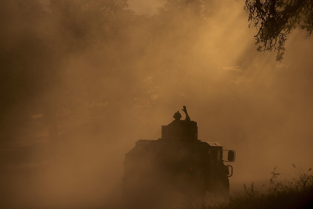 Army Reserve soldiers move on dusty trails during Warrior Exercise at Fort Hunter Liggett, California, June 20, 2017. The soldiers are assigned to the 339th Military Police Company from Davenport, Iowa. Army Reserve photo by Master Sgt. Michel Sauret

