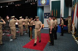 170615-N-TB177-0047 MANAMA, Bahrain (June 15, 2017) Lt. Cmdr. Kurt Albaugh, commanding officer of USS Devastator (MCM 6), departs through side boys during a change of command ceremony at Naval Support Activity Bahrain. Devastator is the sixth of 14 Avenger-class mine countermeasures ships and the second ship to bear its name. (U.S. Navy photo by Mass Communication Specialist 2nd Class Kevin J. Steinberg)