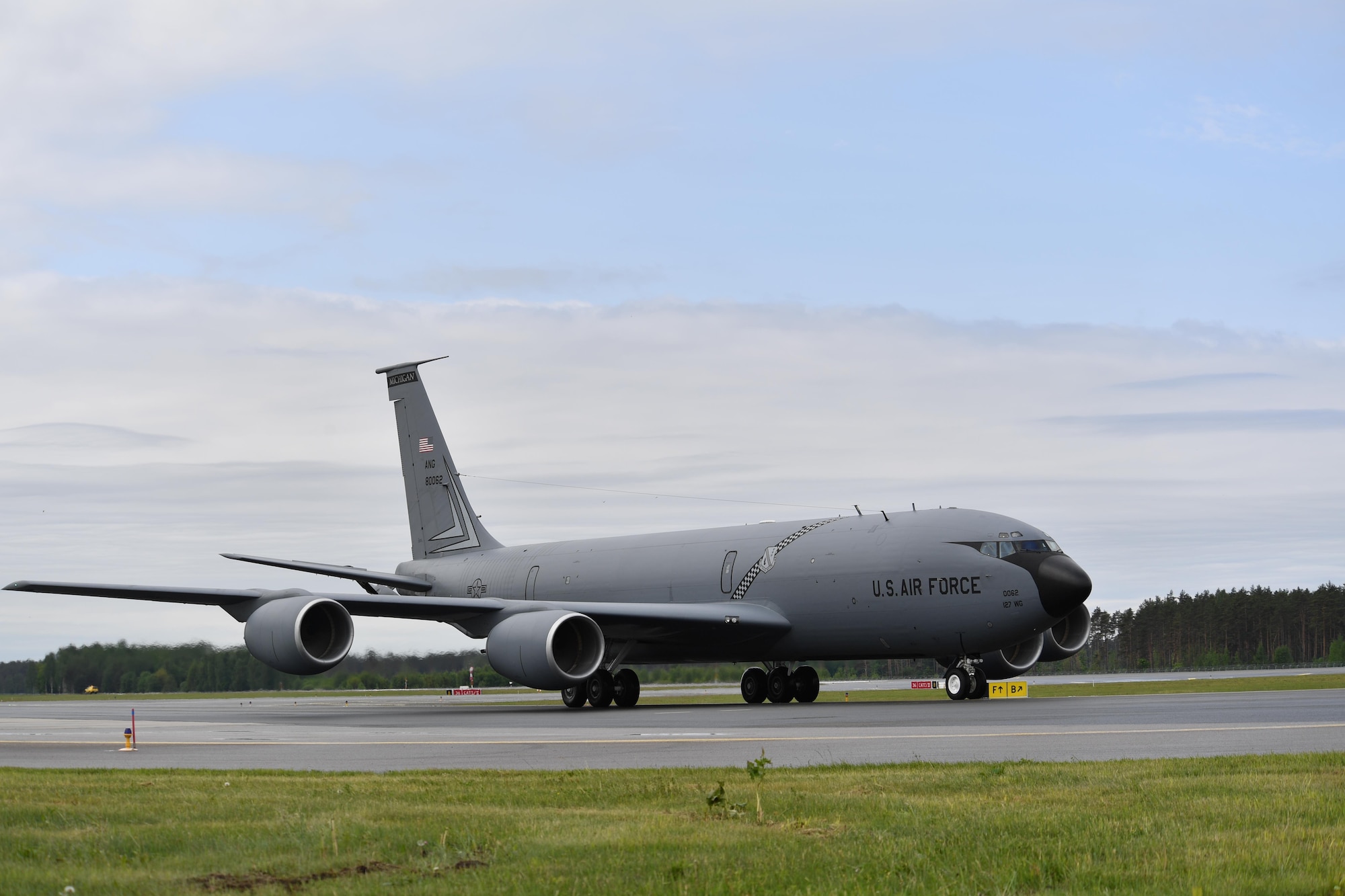 A KC-135 Stratotanker from the 127th Air Refueling Squadron, Selfridge Air National Guard Base, Michigan, taxis to its parking spot after landing at Riga International Airport, Latvia, June 4, 2017. The KC-135’s arrival marked the beginning of Air Force assets in Latvia for exercise Saber Strike 17. The exercise continues to increase participating nations’ capacities to conduct a full spectrum of military operations. (U.S Air Force photo by Senior Airman Tryphena Mayhugh)