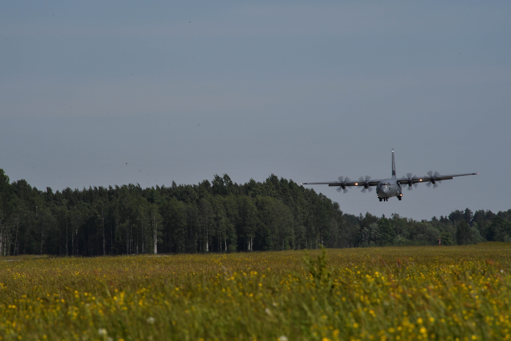 A U.S. Air Force C-130J Super Hercules from the 37th Airlift Squadron, Ramstein Air Base, Germany, flies in to land for exercise Saber Strike 17 at Lielvarde Air Base, Latvia, June 7, 2017. 11,000 U.S. and NATO military members from 20 countries participated in the exercise from May 28 to June 24 throughout  the Baltics and Poland. The combined training opportunities that Saber Strike 17 provides greatly improve interoperability among participating NATO Allies and key regional partners. (U.S Air Force photo by Senior Airman Tryphena Mayhugh)