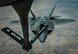 An F-22 Raptor prepares to receive fuel from a KC-135 Stratotanker assigned to the 340th Expeditionary Air Refueling Squadron during a mission in support of Operation Inherent Resolve, June 20, 2017. The F-22 is a component of the Global Strike Task Force, supporting U.S. and coalition forces working to liberate territory and people under the control of ISIS. (U.S. Air Force photo by Staff Sgt. Michael Battles) 