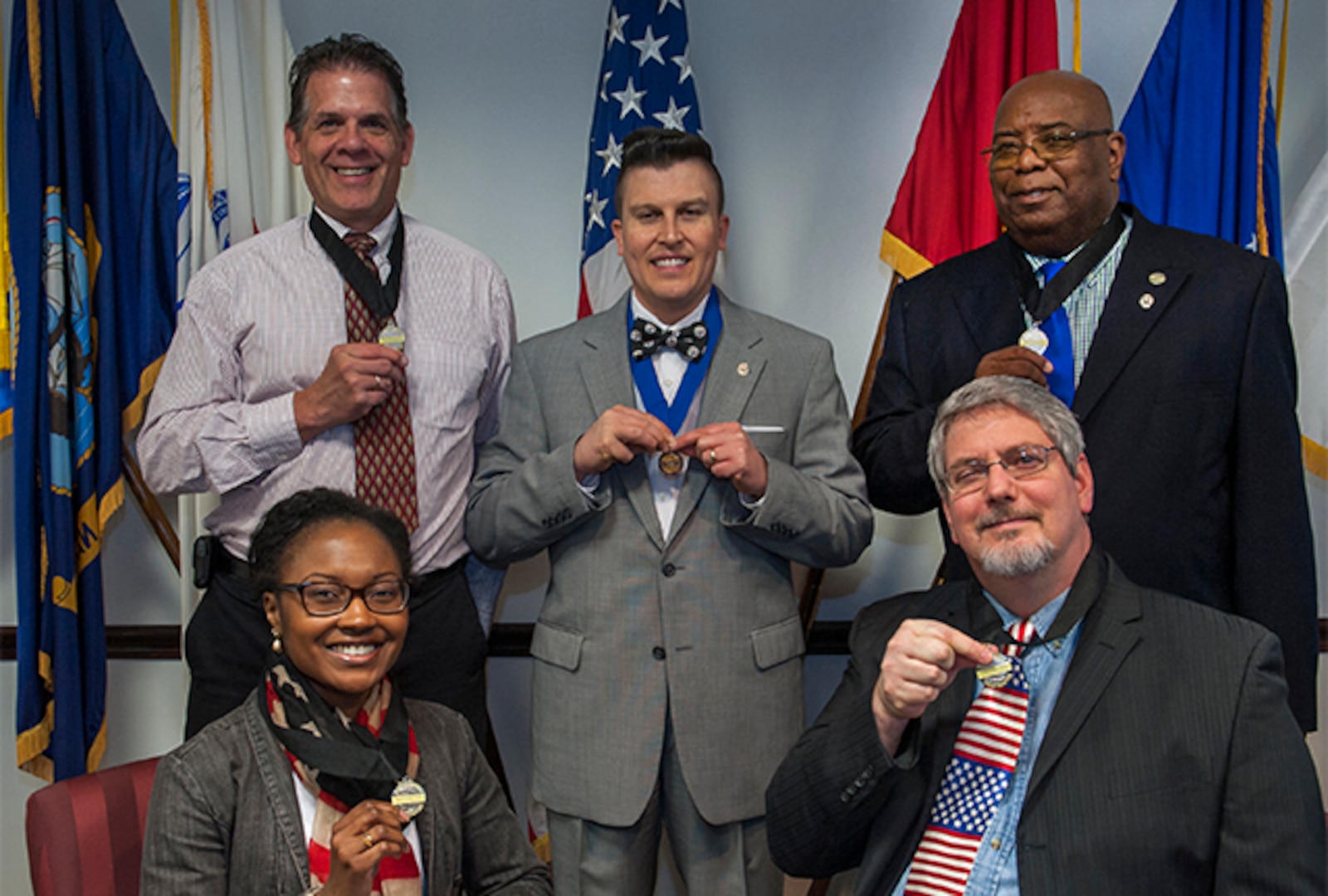 Members of AGOISSI Toastmasters celebrate the 55th Anniversary of the club.