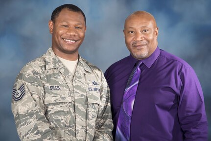 Tech. Sgt. Jesse Sills Jr. and Jesse Sills Sr. pose for a photo June 14, 2017 at Joint Base San Antonio-Randolph, Texas. Sills Jr. is the NCO in charge of first sergeant assignments at the Air Force Personnel Center, while Sills Sr. also works at AFPC as a human resources specialist. (U.S. Air Force photo by Sean Worrell) 