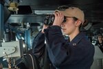 Lt. Jillianne Planeta stands the officer of the deck watch on the bridge of the Nimitz-class aircraft carrier USS Carl Vinson (CVN 70) in the Pacific Ocean. The U.S. Navy has patrolled the Indo-Asia-Pacific routinely for more than 70 years promoting regional peace and security.