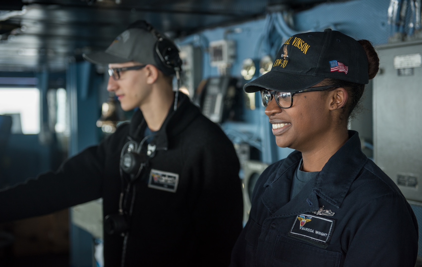 Lt. Jillianne Planeta stands the officer of the deck watch on the bridge of the Nimitz-class aircraft carrier USS Carl Vinson (CVN 70) in the Pacific Ocean. The U.S. Navy has patrolled the Indo-Asia-Pacific routinely for more than 70 years promoting regional peace and security.