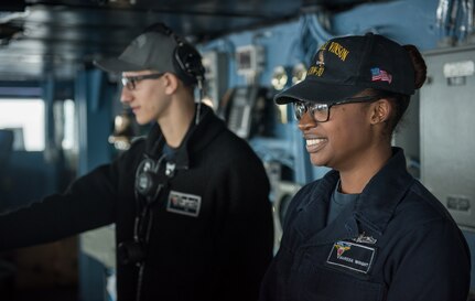 Lt. Jillianne Planeta stands the officer of the deck watch on the bridge of the Nimitz-class aircraft carrier USS Carl Vinson (CVN 70) in the Pacific Ocean. The U.S. Navy has patrolled the Indo-Asia-Pacific routinely for more than 70 years promoting regional peace and security.