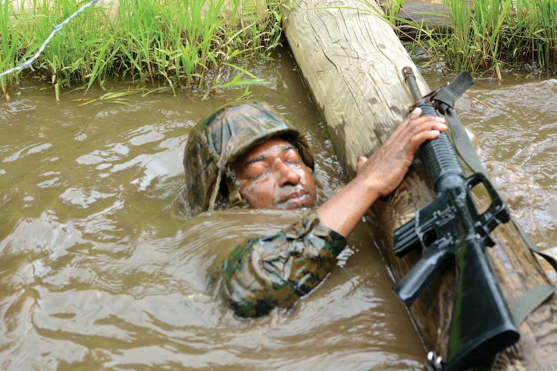 Marines at Officer Candidates School recently celebrated the 50th anniversary of "The Quigley", a rigorous obstacle course that has stood the test of time since 1967.