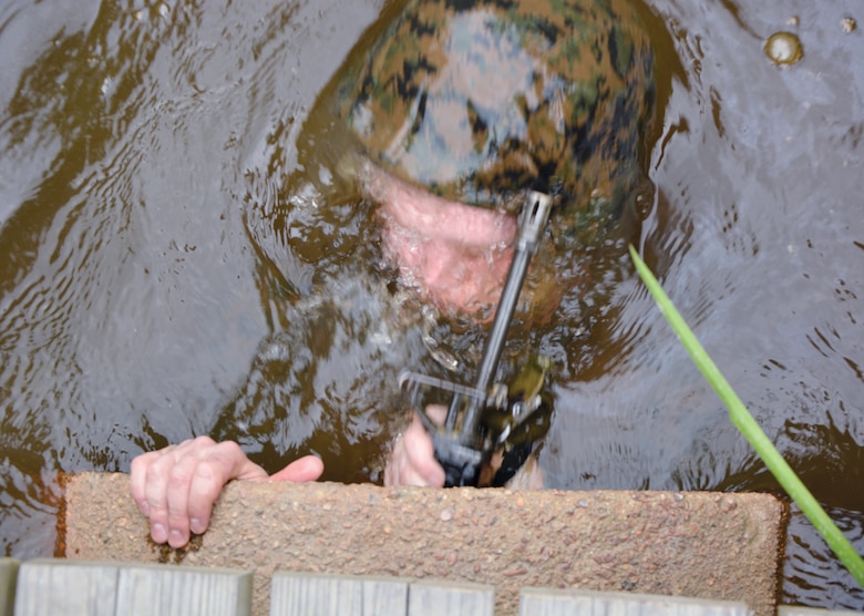 Marines at Officer Candidates School recently celebrated the 50th anniversary of "The Quigley", a rigorous obstacle course that has stood the test of time since 1967.