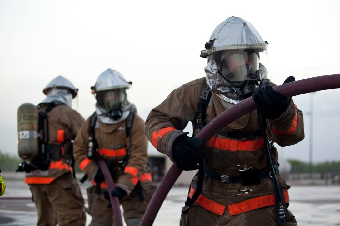 U.S. Marines assigned to the Fire Protection Apprentice Course, Marine detachment Goodfellow, conduct training exercises on a simulated downed aircraft at Joint Airforce Base Goodfellow, Texas, March 24, 2017. The mission of Marine Detachment Goodfellow is to train Marines in the occupational fields of Fire Protection and Signals Intelligence for the Fleet Marine Force. (U.S. Marine Corps photo by Lance Cpl. Jose Villalobosrocha)