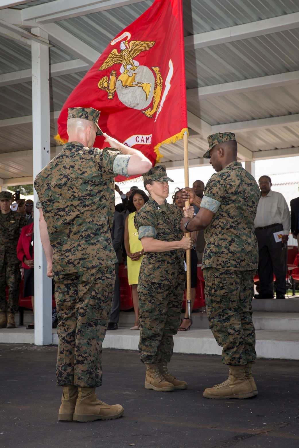 Major General Lori Reynolds, commanding general, Marine Corps Cyber Command, awards the Legion of Merit medal to Colonel Julie Nethercot, outgoing commanding officer of Officer Candidate School, for her efforts and achievements while in command at her change of command ceremony aboard the OCS parade deck, June 3, 2017.