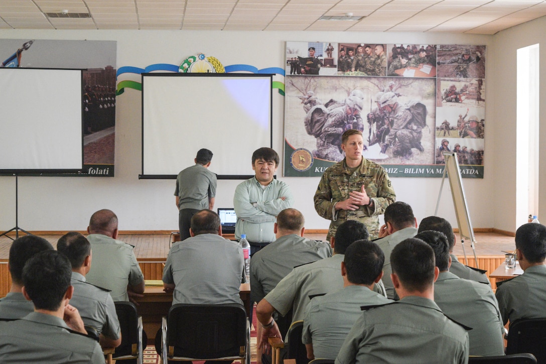 After a four-day tactical communications military-to-military engagement between the Uzbekistan Armed Forces and the U.S. Army, Staff Sgt. Joshua Atanovich, 149th Military Engagement Team, made some final remarks and thanked the Uzbek audience for being receptive and engaged throughout the week. The tactical communications engagement took place June 13-16, 2017, at the Tashkent Institute of Information Technologies in Tashkent, Uzbekistan. (U.S. Army photo by William Gordley, 149th Military Engagement Team)