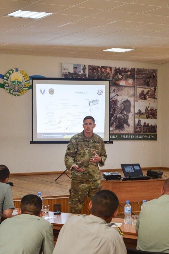 Staff Sgt. Joshua Atanovich, 149th Military Engagement Team, shares his experiences during a discussion with Uzbek soldiers about wave propagation and high frequency transmission on the first day of a tactical communications military-to-military engagement June 13, 2017, at the Tashkent Institute of Information Technologies in Tashkent, Uzbekistan. The discussion provided both Uzbek and U.S. Army Soldiers clarity for overcoming real-world obstacles, and solutions to apply when in a tactical field environment. (U.S. Army photo by Staff Sgt. William Gordley, 149th Military Engagement Team)