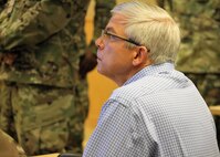 U.S. Air Force Lt. Col. Harold Ennulat (Retired), a lead program development manager at the Carnegie Mellon University, Software Engineering Institute, evaluates teams for a training exercise during the Cyber X-Games, hosted by the Army Reserve Cyber Operations Group, 335th Signal Command (Theater), June 15 at Carnegie Mellon University. Cyber X Games is a five-day exercise focusing on advanced areas of cyber security training. Cyber X Games is also part of Cyber Endeavour, the Department of Defense-sponsored conference for military and civilian practitioners from across government, industry and academia to address the nexus of cyberspace and national security. (U.S. Army Reserve photo by 
Sgt. Erick Yates)