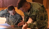 U.S. Army Maj. Tom O’Keefe (Left), assigned to the North Central Cyber Protection Center, a unit part of the Army Reserve Cyber Operations Group (ARCOG), 335th Signal Command (Theater), and Sgt. 1st Class Matthew R. Wagner (Right), a senior information systems analyst with the North East Cyber Protection Center, also part of the ARCOG, participate in a training exercise during the Cyber X-Games, hosted by the ARCOG, June 16 at Carnegie Mellon University. Cyber X-Games is a five-day exercise focusing on advanced areas of cyber security training.  Cyber X-Games is also part of Cyber Endeavour, the Department of Defense-sponsored conference for military and civilian practitioners from across government, industry and academia to address the nexus of cyberspace and national security. (U.S. Army Reserve photo by Sgt. Erick Yates)