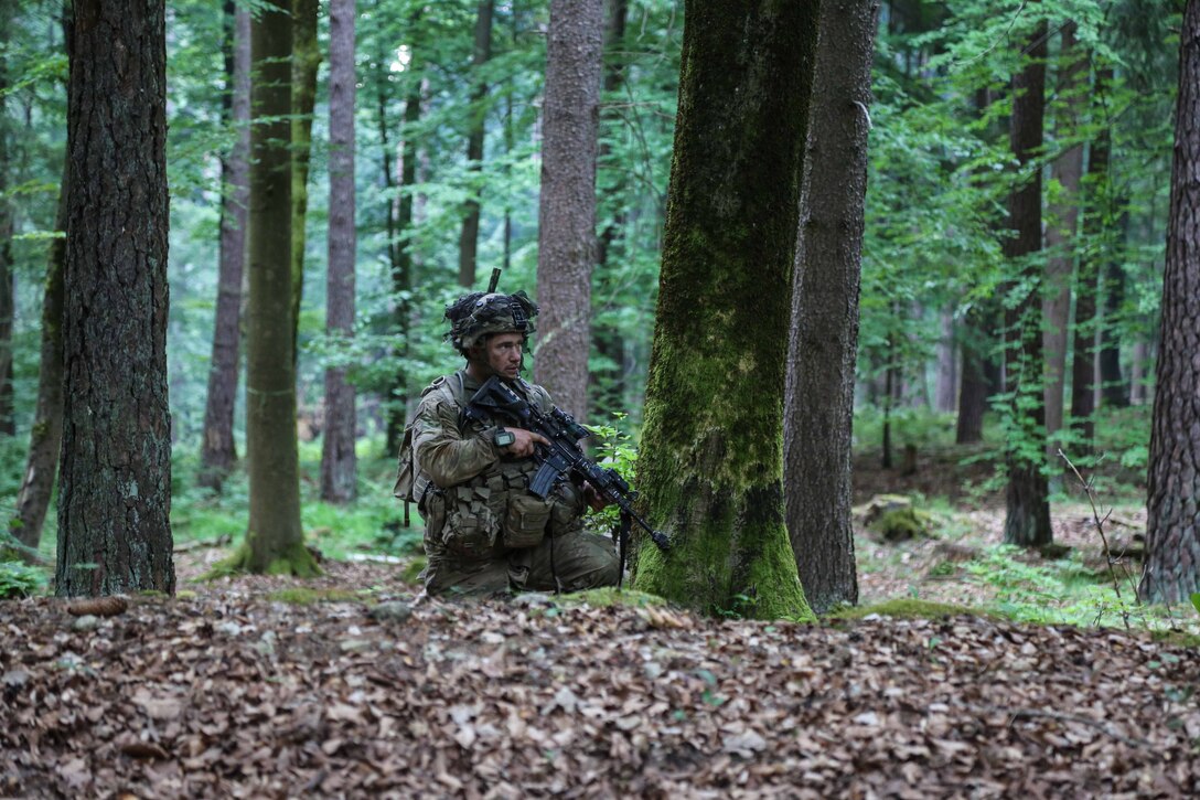 A soldier assigned to the 4th Squadron, 10th Cavalry Regiment, 4th Infantry Division scans his sector of fire while reporting enemy activities during Exercise Combined Resolve VIII at the Hohenfels Training Area, Hohenfels, Germany, June 12, 2017. Exercise Combined Resolve VIII is a multinational exercise designed to train the Army’s Regionally Allocated Forces to the U.S. European Command. Combined Resolve VIII will include more than 3,400 participants from 10 nations. The goal of the exercise is to prepare forces in Europe to operate together to promote stability and security in the region. Army photo by Sgt. Matthew Hulett