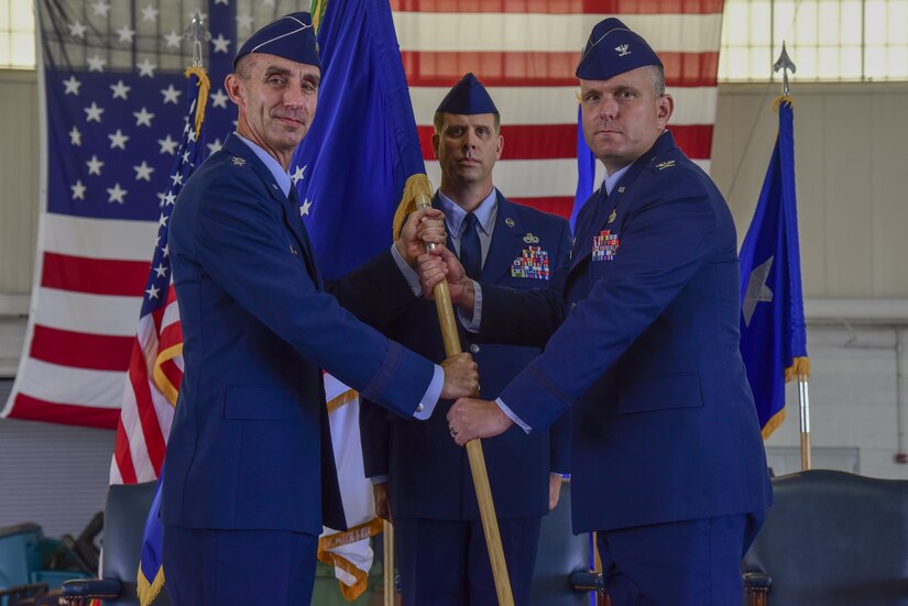 U.S. Air Force Maj. Gen. Scott J. Zobrist, 9th Air Force commander, passes command to Col. Sean Tyler, 633rd Air Base Wing incoming commander, during a change of command ceremony at Joint Base Langley-Eustis, Va., June 22, 2017. Tyler assumed command after serving as the Defense Logistics Agency executive officer to the director, Fort Belvoir, Va. (U.S. Air Force photo by Airman 1st Class Tristan Biese)