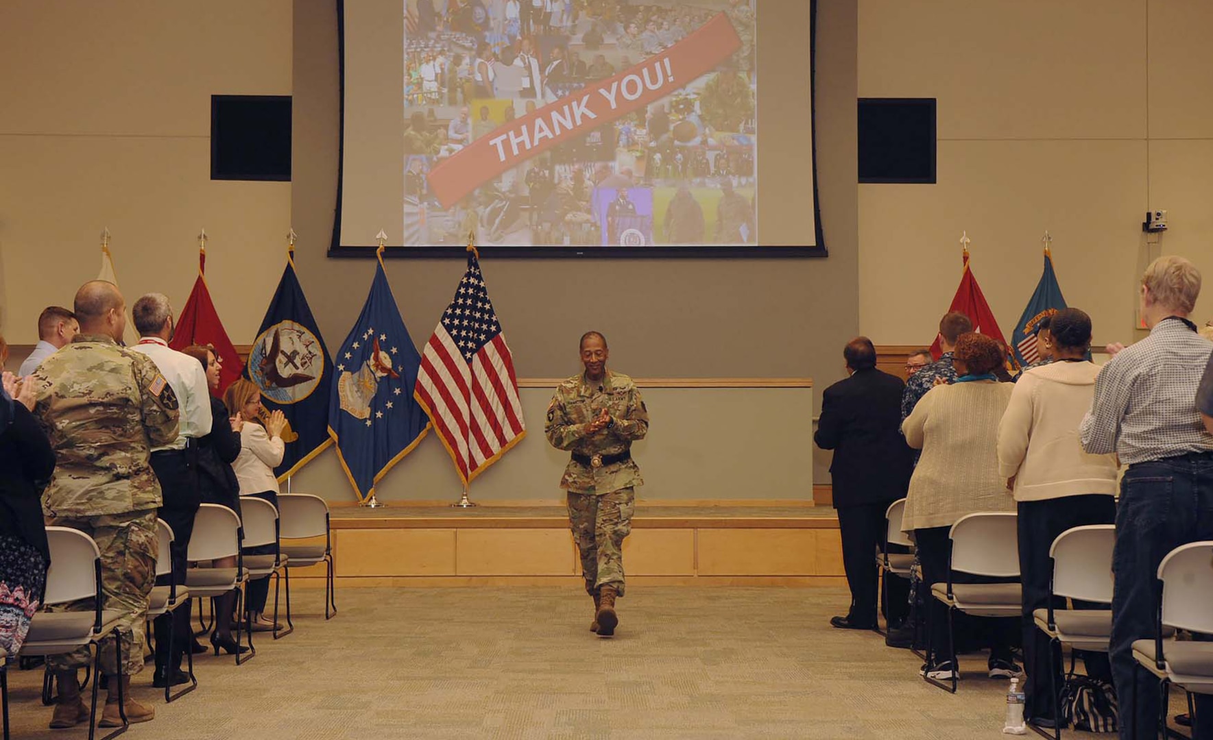 Army Brig. Gen. Charles Hamilton, DLA Troop Support commander, gets a standing ovation at the conclusion of his final workforce town hall June 20. Earlier, he played a video in which customers from around the world thanked Troop Support employees for their support.
