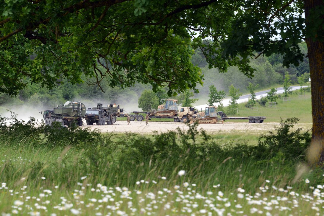 Vehicles and equipment are set up during the 2nd Cavalry Regiment’s demonstration of a Wet Gap Crossing in preparation for Exercise Saber Guardian 17 in Grafenwoehr, Germany, June 8, 2017. Exercise Saber Guardian 17 is a U.S. European Command, U.S. Army Europe-led annual exercise taking place in Hungary, Romania and Bulgaria in the summer of 2017. This exercise involves more than 25,000 service members from over 20 ally and partner nations. The largest of the Black Sea Region exercises, Saber Guardian 17 is a premier training event for U.S. Army Europe and participating nations that will build readiness and improve interoperability under a unified command, executing a full range of military missions to support the security and stability of the Black Sea Region. Army photo by Gertrud Zach