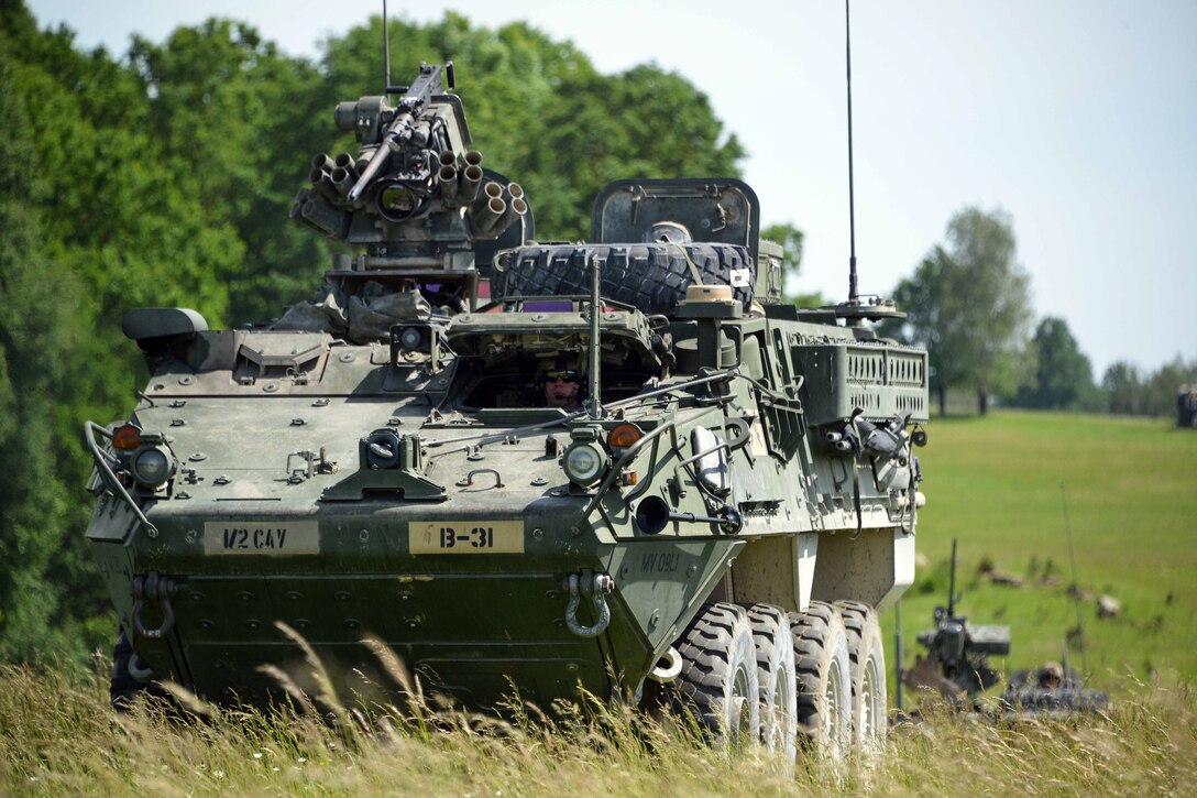 A Stryker vehicle rolls across a field during the 2nd Cavalry Regiment’s demonstration of a Wet Gap Crossing in preparation for Exercise Saber Guardian 17 in Grafenwoehr, Germany, June 8, 2017. Exercise Saber Guardian 17 is a U.S. European Command, U.S. Army Europe-led annual exercise taking place in Hungary, Romania and Bulgaria in the summer of 2017. This exercise involves more than 25,000 service members from over 20 ally and partner nations. The largest of the Black Sea Region exercises, Saber Guardian 17 is a premier training event for U.S. Army Europe and participating nations that will build readiness and improve interoperability under a unified command, executing a full range of military missions to support the security and stability of the Black Sea Region. Army photo by Gertrud Zach