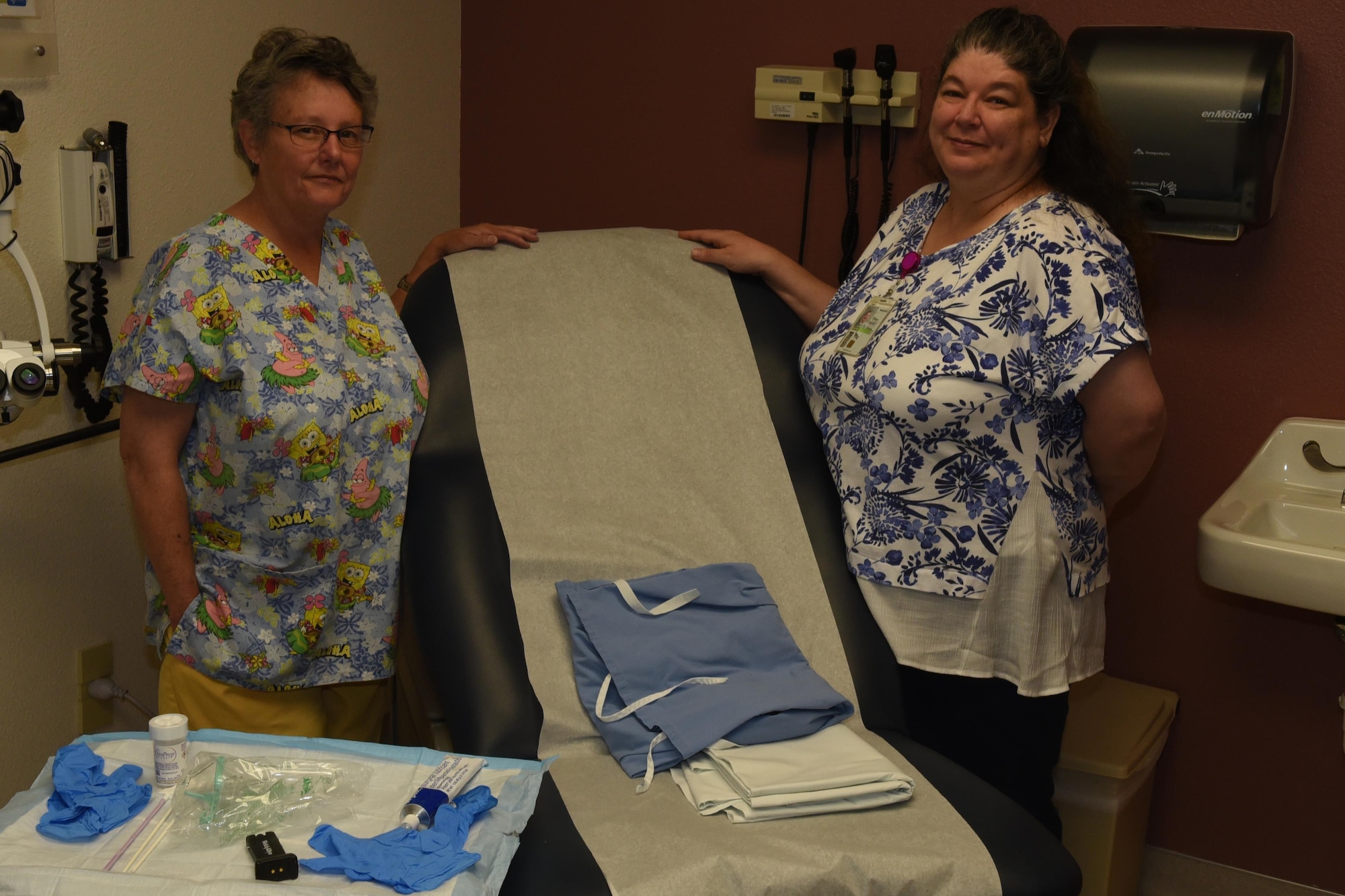 Laura Griffith and Ann Nourse, 90th Medical Operations Squadron registered nurses, pose in the Women’s Health Clinic at F.E. Warren Air Force Base, Wyo., June 15, 2017. The new clinic was added to ensure women are getting the medical support they need without having to go off base to be seen. (U.S. Air Force photo by Terry Higgins) 