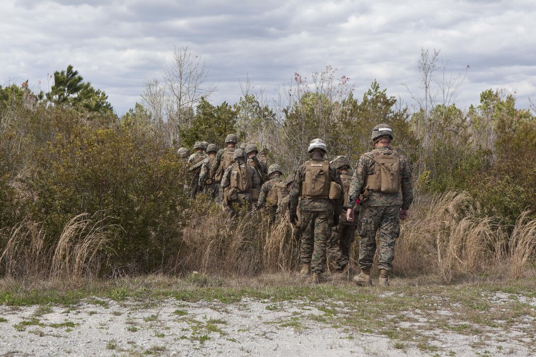 U.S. Marines assigned to Advanced Infantry Training Battalion the School of Infantry-East (SOI-E), begin a combined arms exercise at Camp Lejeune, N.C. April 7, 2017. The mission of SOI-E is to train entry-level and advanced level Marines in the skills required of an infantry Marine for the operating forces. (U.S. Marine Corps photo by Lance Cpl. Tyler Pender)