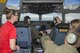 Maj. Evin Negron, 3d Airlift Squadron C-17 Globemaster III pilot, talks with members of the Leadership Central Delaware Class of 2017 while in flight June 13, 2017, on Dover Air Force Base, Del. The class was able to fly in a C-17 and be part of a mock mid-air refueling.  (U.S. Air Force photo by Staff Sgt. Jared Duhon)