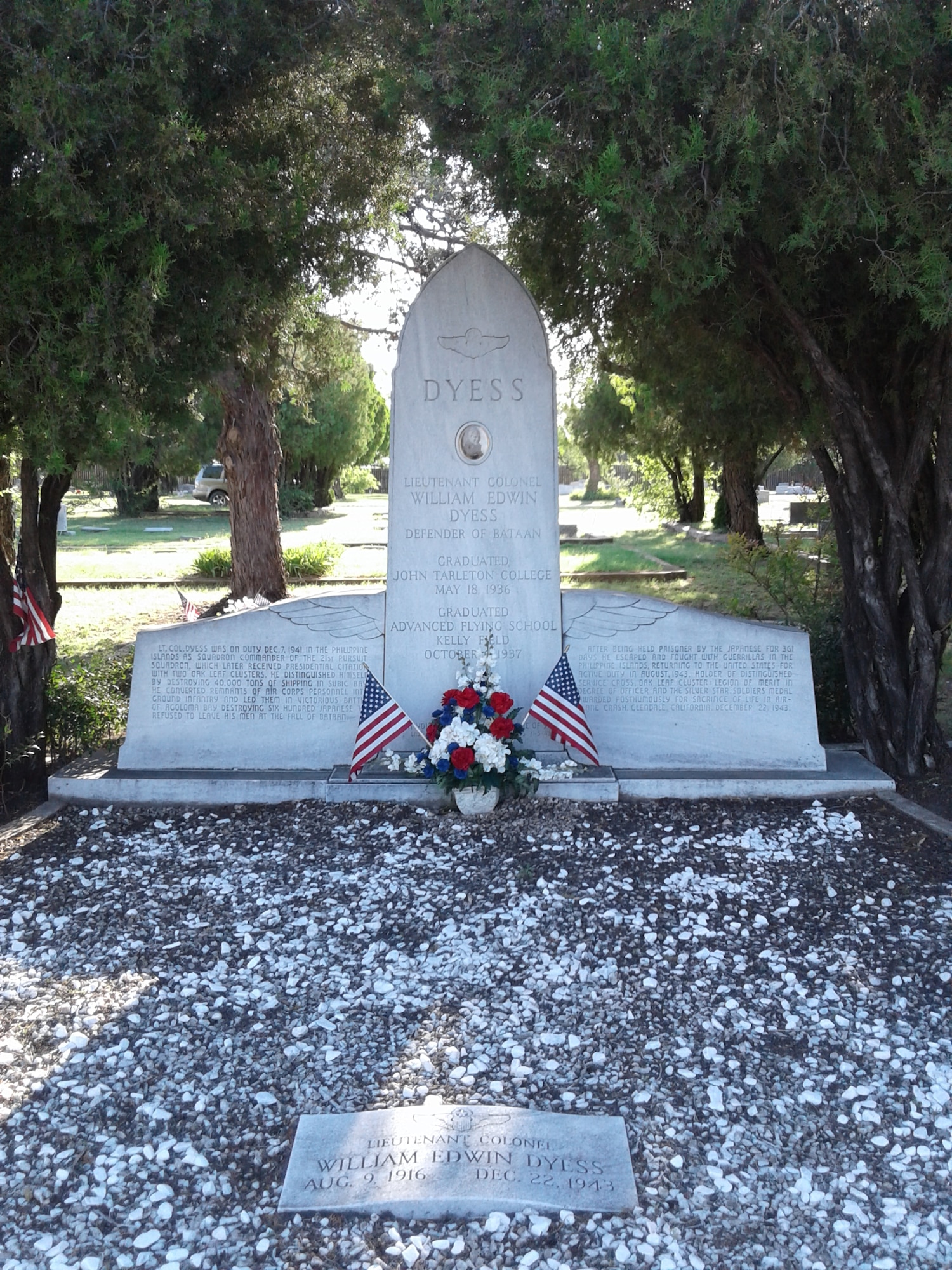 The group of Airmen and their families that participated in the event visited the Albany cemetery to visit the gravesite of Lt. Col. Dyess in Albany, Texas June 16, 2017. While at the cemetery, Elizabeth “Nell” (Dyess) Denman, Eddie Dyess's little sister talked about Eddie’s life and achievements, both locally and in the military.  (Courtesy Photo)