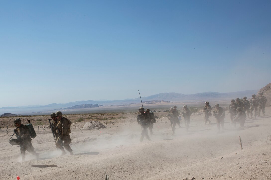 U.S. Marines with Golf Company, 2nd Battalion, 25th Marines, 4th Marine Division, Marine Forces Reserve, push through the inital breach on range 400 as part of Integrated Training Exercise 4-17 at Camp Wilson, Twentynine Palms, California on June 18, 2017. ITX 4-17 is a live-fire and maneuver combined arms exercise designed to train battalion and squadron-sized units in the tactics, techniques, and procedures required to provide a sustainable and ready operational reserve for employment across the full spectrum of crisis and global engagement.