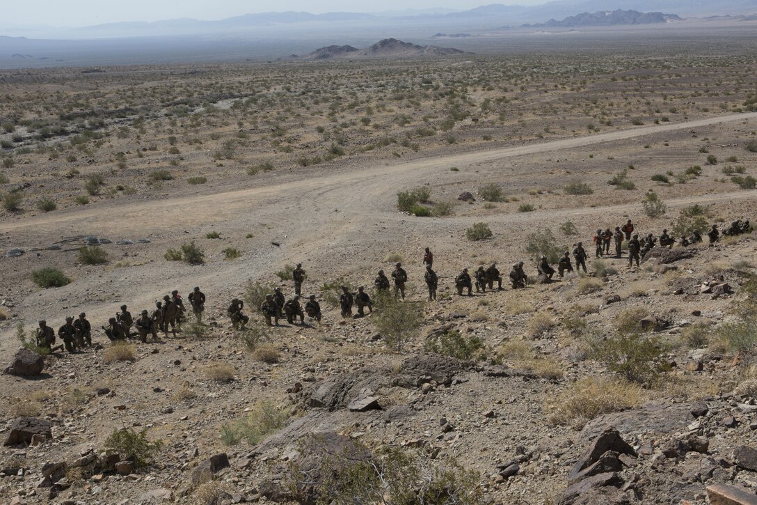 U.S. Marines with Golf Company, 2nd Battalion, 25th Marines, 4th Marine Division, Marine Forces Reserve, prepare to move on range 400 during Integrated Training Exercise 4-17 at Camp Wilson, Twentynine Palms, California on June 18, 2017. ITX is the largest annual Marine Forces Reserve training exercise, bringing together over 5,000 Marines from across the United States to prepare battalion and squadron-sized units for combat, under the most realistic conditions possible.