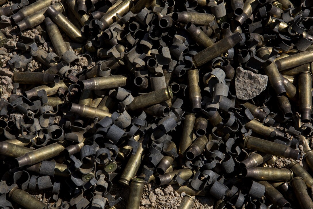 A pile of empty shells sit in gravel after being used by Marines with Golf Company, 2nd battalion, 25th Marines, 4th Marine Division, Marine Forces Reserve, on range 400 as part of the annual Integrated Training Exercise 4-17 at Camp Wilson, Twentynine Palms, California on June 18, 2017. ITX is the largest annual Marine Forces Reserve training exercise, bringing together over 5,000 Marines from across the United States to prepare battalion and squadron-sized units for combat, under the most realistic conditions possible.