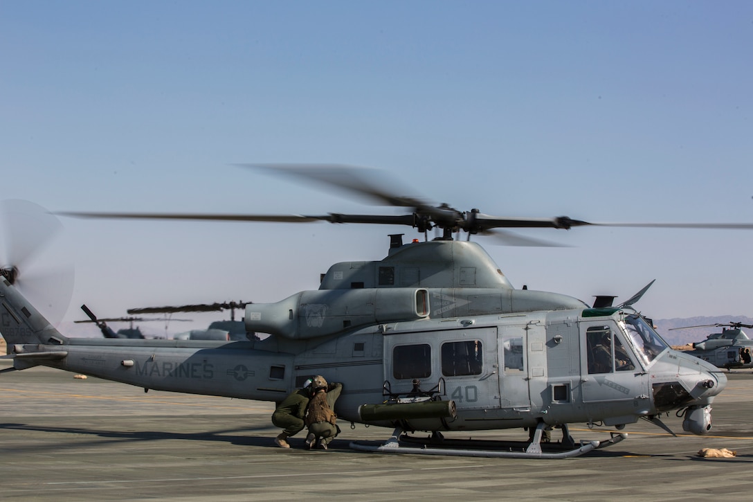 U.S. Marines with Marine Light Attack Helicopter Squadron 773, Marine Aircraft Wing 49, 4th Marine Aircraft Wing prepare a UH-1Y Huey for take-off for a battlefield reconnaisance mission with Col. Thomas E. Prentice, commanding officer, 23rd Marine Regiment, 4th Marine Division, Marine Forces Reserve, at Marine Air Ground Combat Center Twentynine Palms, California during Integrated Training Exercise 4-17, June 20, 2017. The scouting mission was in preparation of the 25th Marine Regiment final battalion exercise during ITX 4-17. (U.S. Marine Corps photo by Imari J. Dubose)